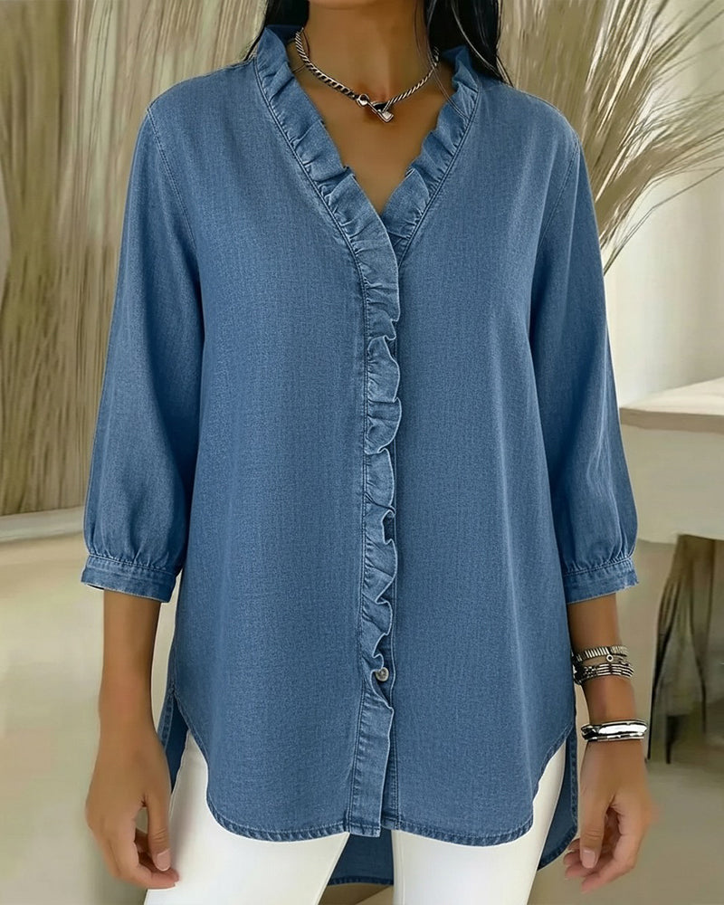 Elvari – Elegant blouse with ruffle details