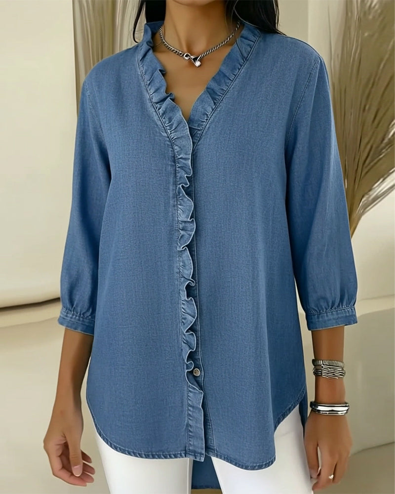 Elvari – Elegant blouse with ruffle details